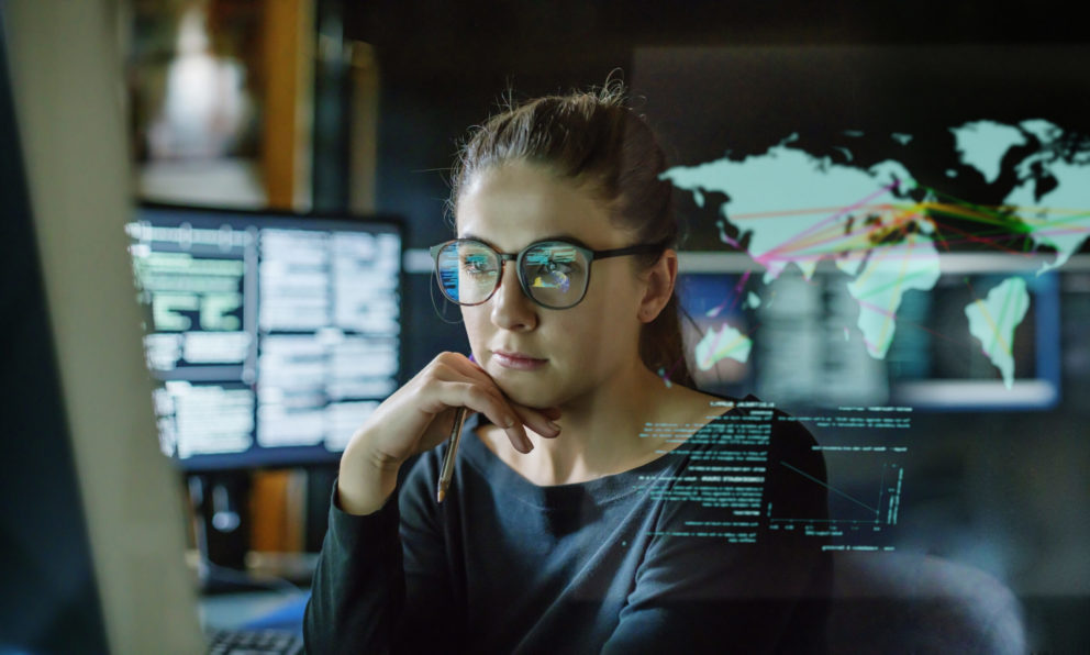 Woman looking at finance on modern screen