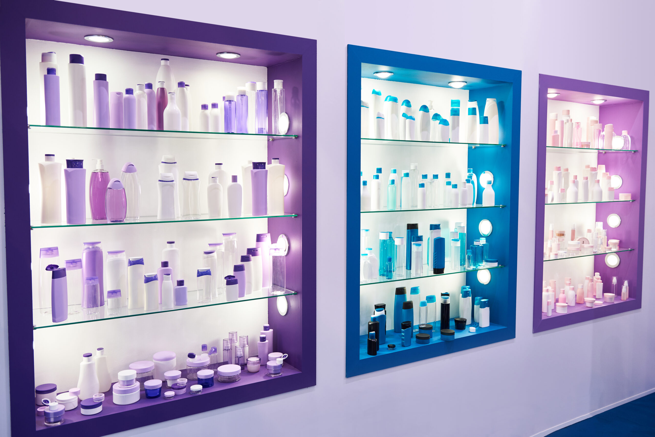 Showcase shop with plastic bottles cosmetic and shampoo