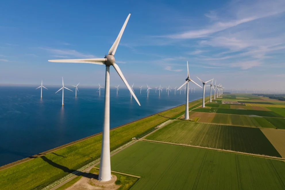 offshore windmill farm in the ocean, westermeerwind park, windmills isolated at sea on a beautiful bright day, netherlands