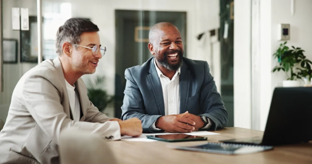 office workers having a video call on a laptop during a business meeting